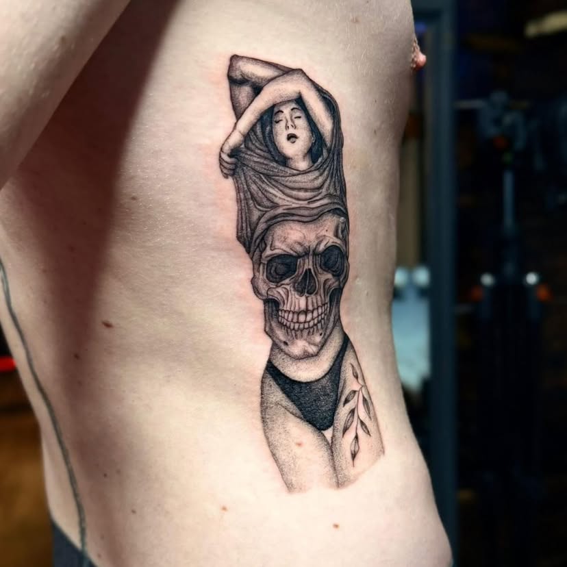 Beneath the surface — realistic rib tattoo by Jason Chamberlain